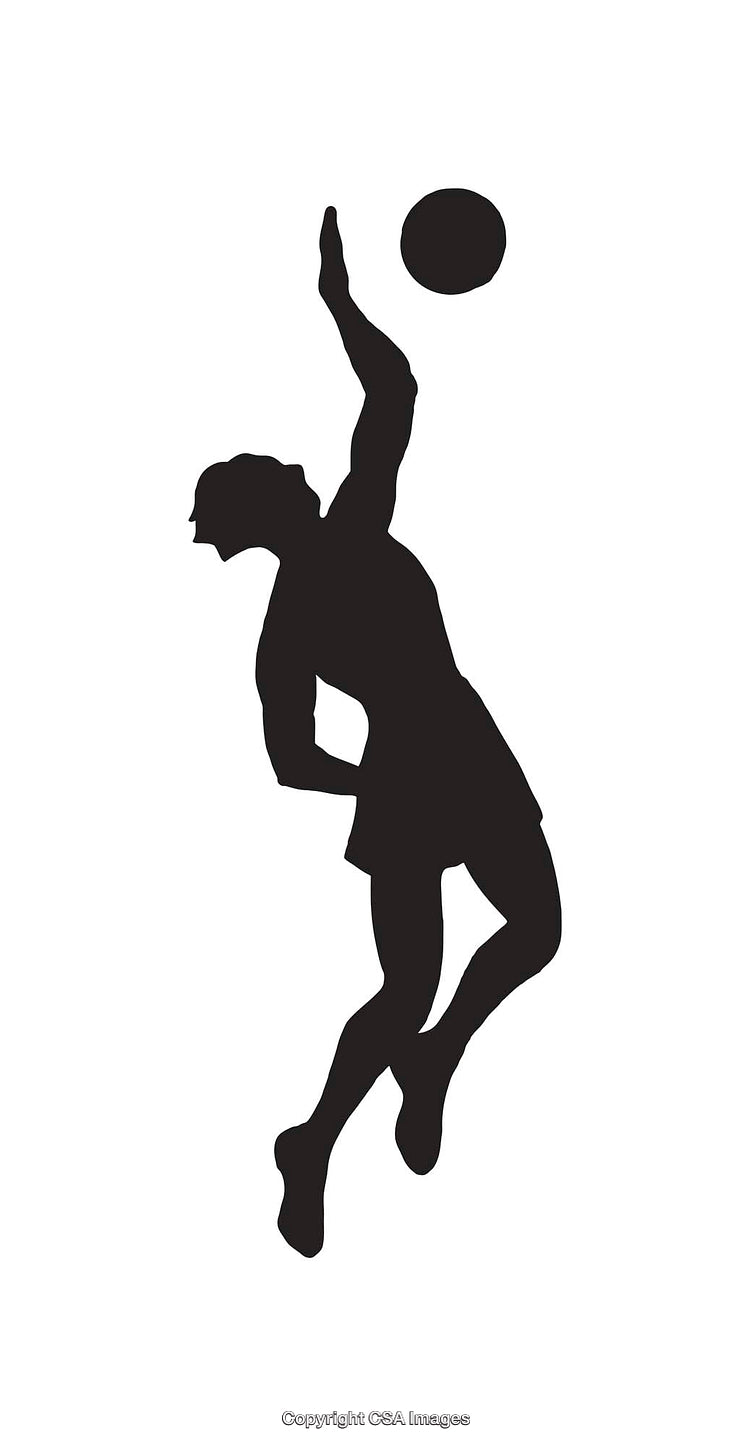Silhouette of an Athlete Jumping to Hit a Ball in Mid-Air