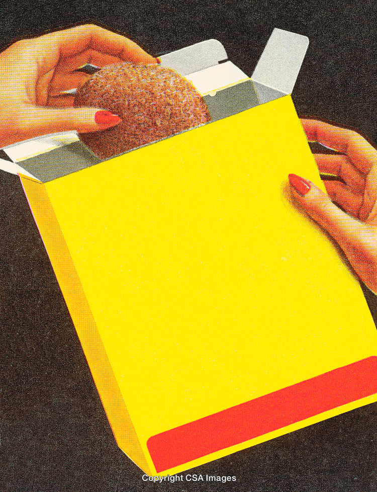 Close-Up of Hands Removing Item from a Bright Yellow Box