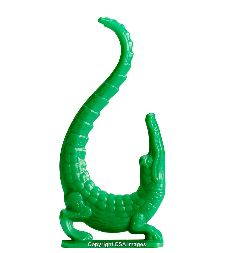 Green Plastic Crocodile Toy in Playful Upright Pose on White Background