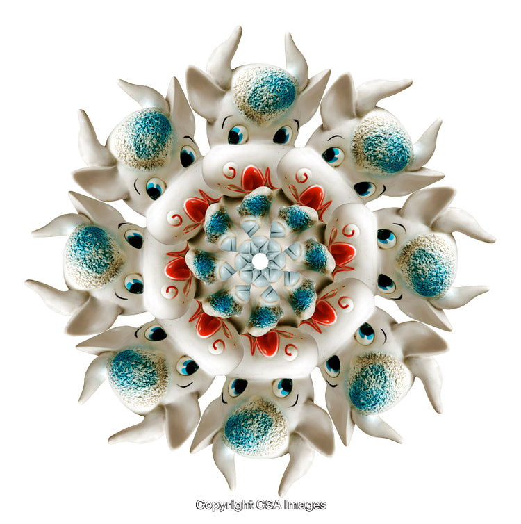 Symmetrical Arrangement of Artistic White and Blue Animal Figures on White Background