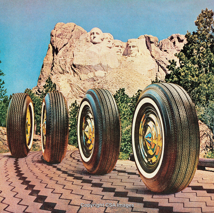 Stylized Image of Tires with Mount Rushmore in the Background
