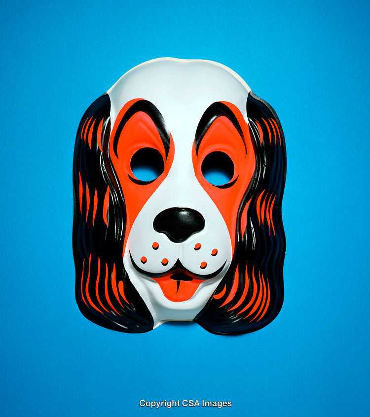 Colorful Plastic Dog Mask on a Vibrant Blue Background