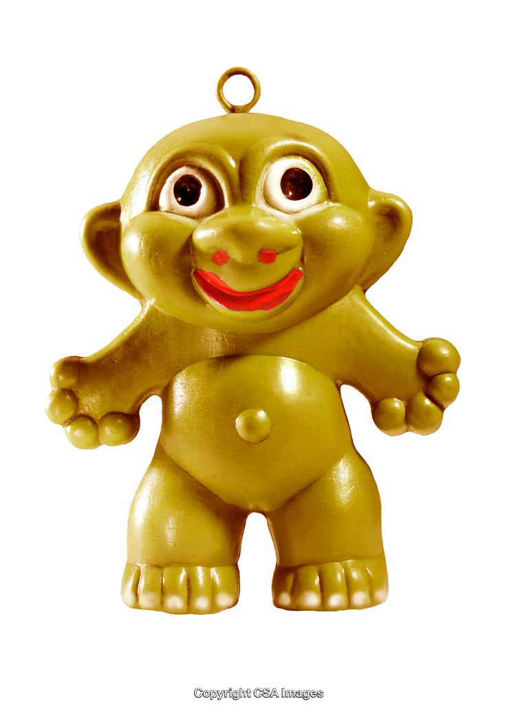Golden Cheery Toy Figurine With Red Details Isolated On White Background