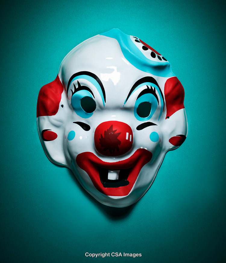Vintage Clown Mask Against Turquoise Background With Bold Red and White Details