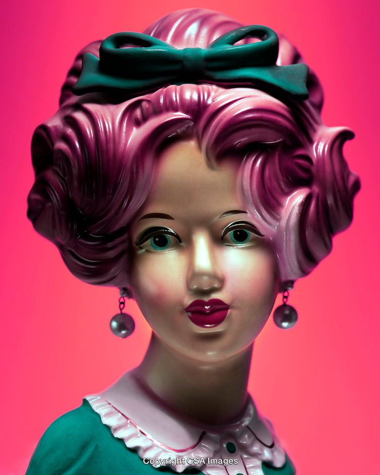 Vintage Styled Figurine with Vibrant Colors and Elegant Features
