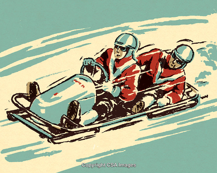 Two Athletes Racing in a Bobsled on a Snowy Track