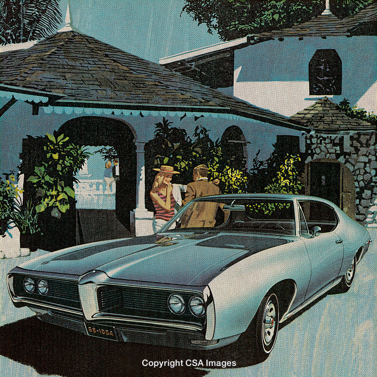 Vintage Car with Couple Near Scenic Building and Tropical Setting
