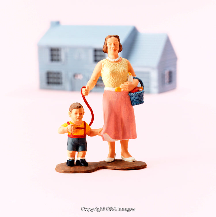 Vintage Style Toy Figures of a Family in a Suburban Setting
