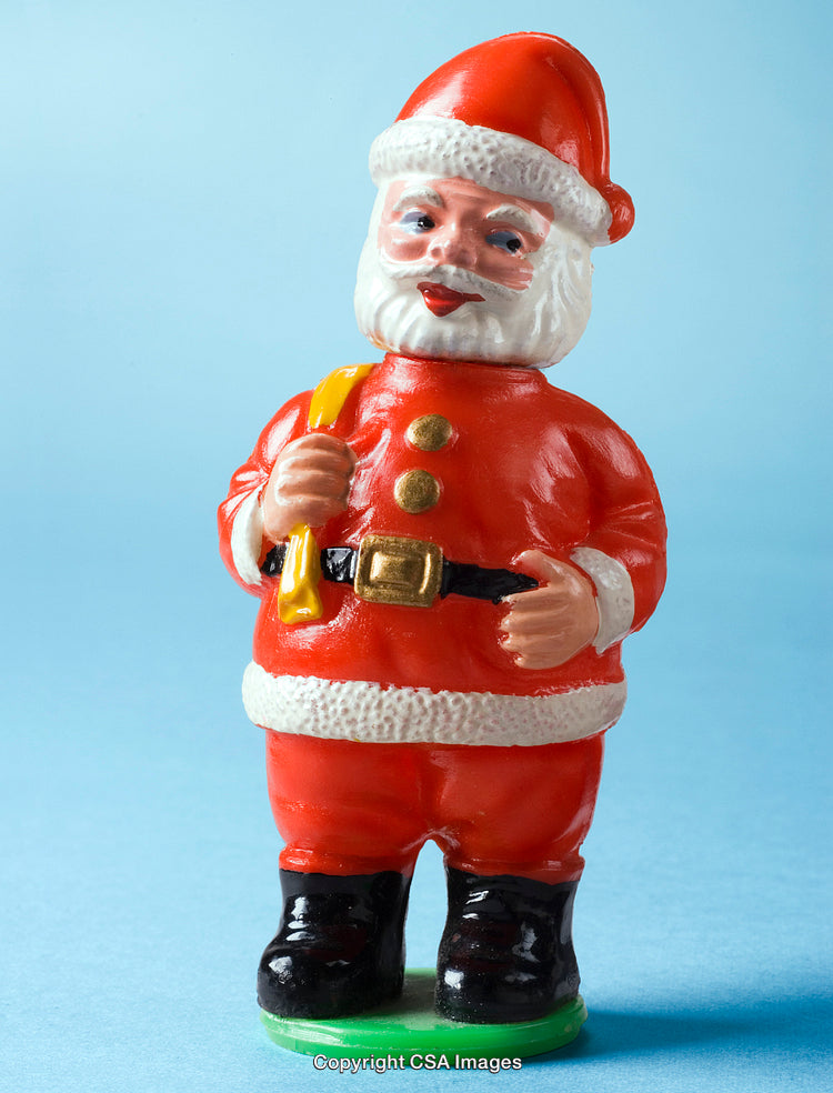 Plastic Santa Claus Figurine on Blue Background for Christmas Decoration
