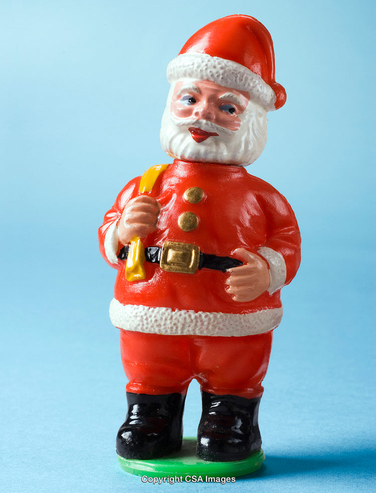 Plastic Santa Claus Figurine on Blue Background for Christmas Decoration