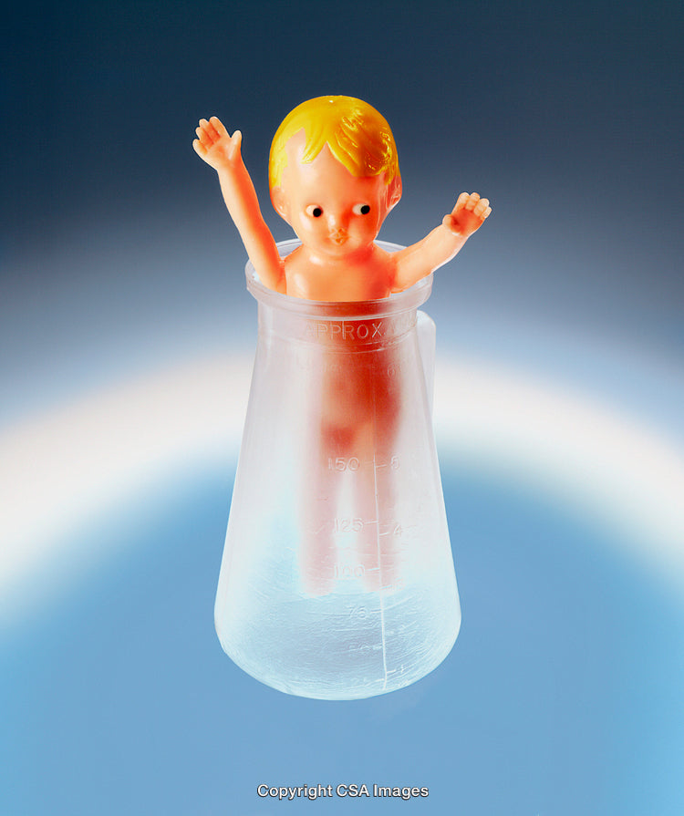 Plastic Doll in a Laboratory Flask on a Gradient Background