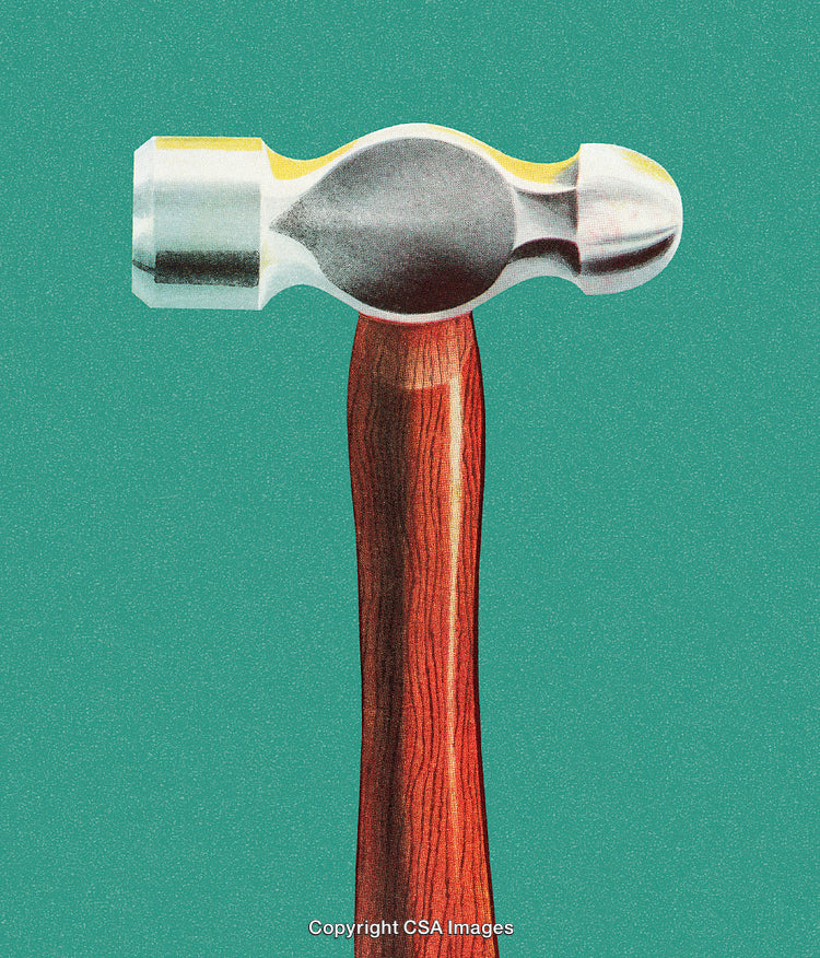 Vintage Claw Hammer Against Green Background Featuring Wood and Metal Design