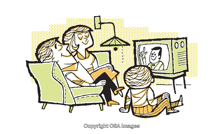Family Relaxing Together Watching Television in Cozy Living Room