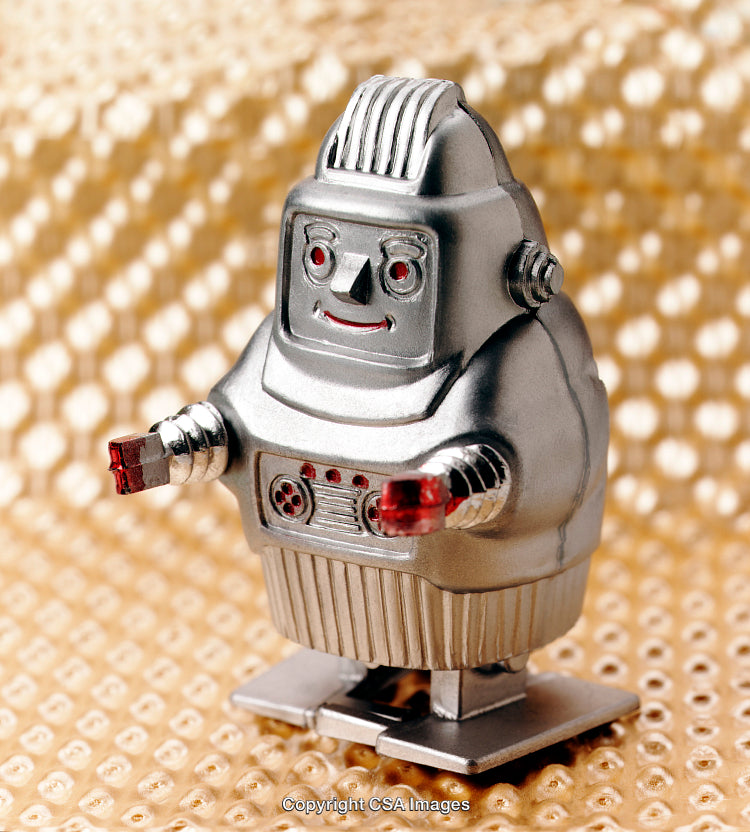 Retro Silver Robot Toy on Sparkling Decorative Background