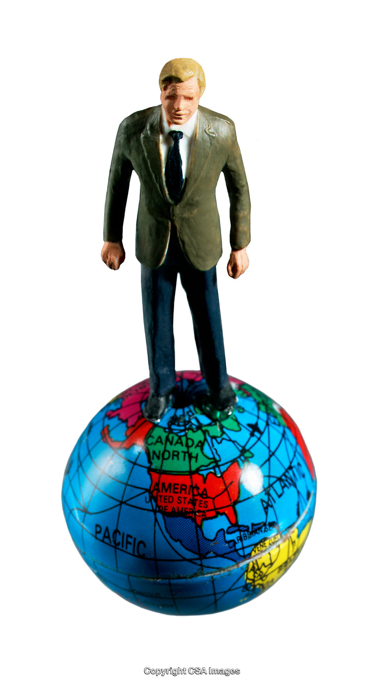 Miniature Businessman Standing on Colorful Globe Representing Global Influence and Leadership
