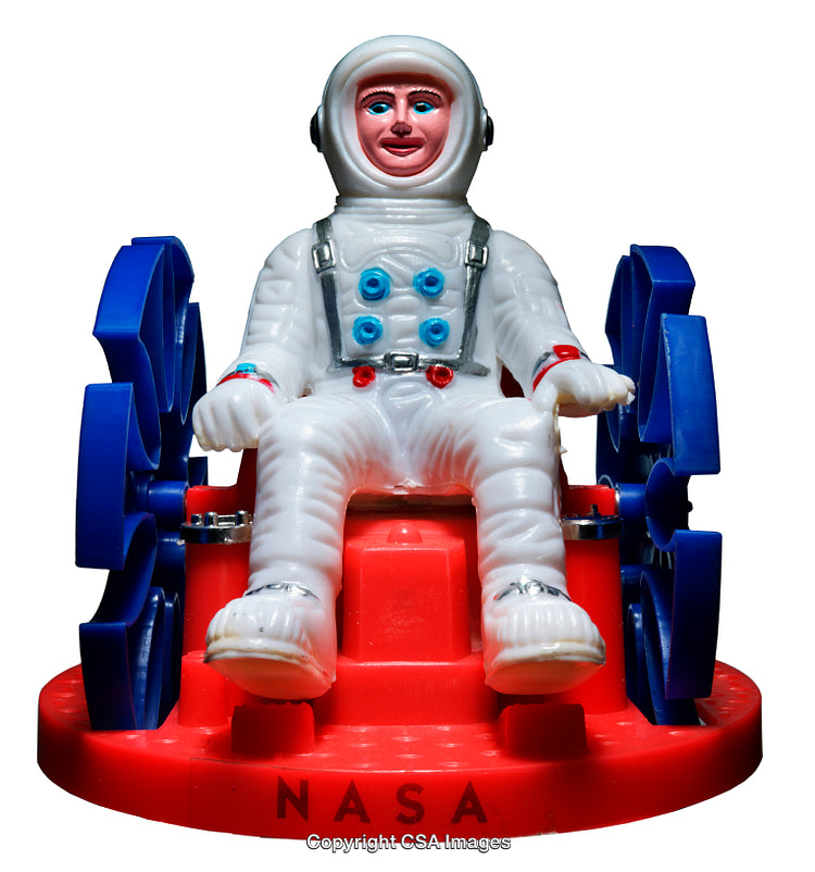 Vintage Toy Astronaut Figure Sitting on Red and Blue Spacecraft Base