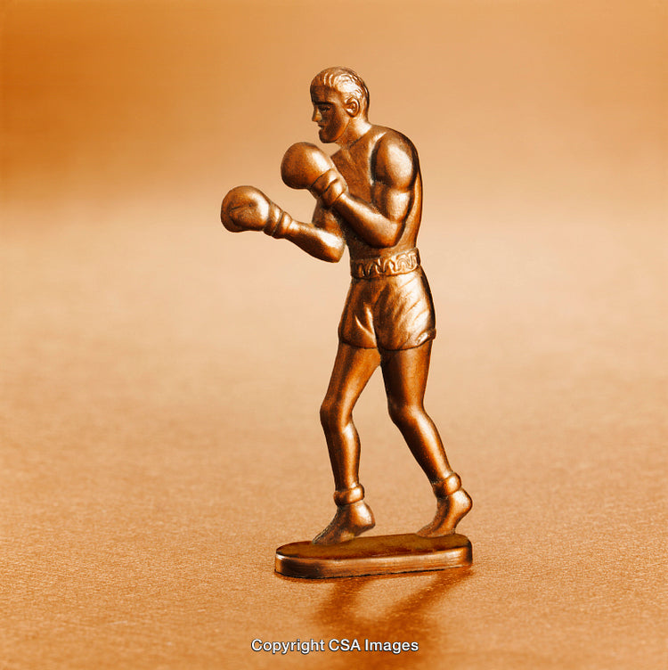 Bronze-Colored Figurine of a Boxer in a Fighting Stance