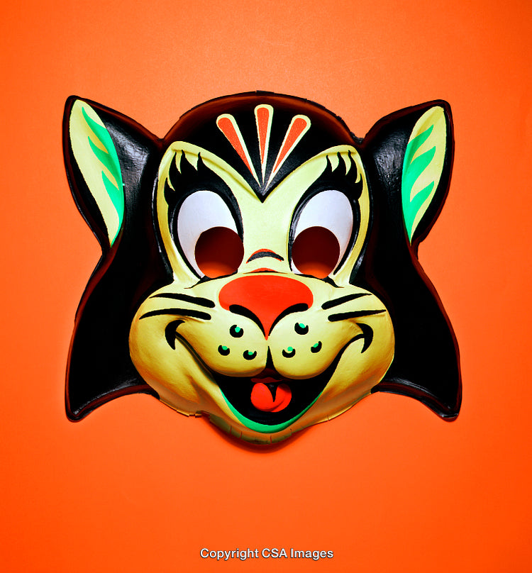 Retro Cat Mask Against Bright Orange Background for Theme Celebrations