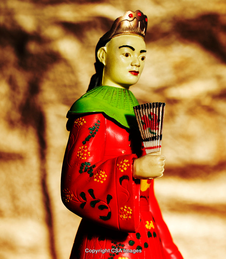 Colorful Figurine of a Traditional Attire with Unique Design