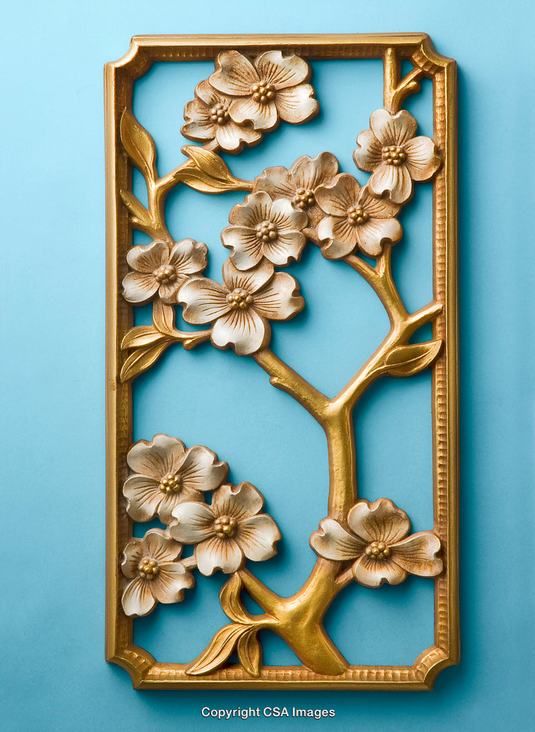 Gold-Plated Floral Frame Against Elegant Light Blue Background
