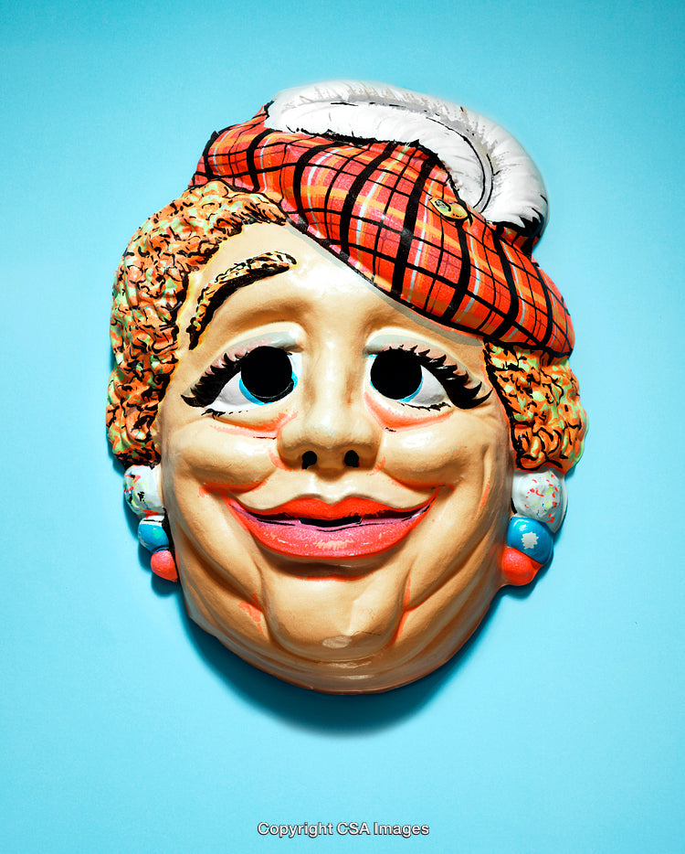 Colorful Vintage Mask With a Cheerful Expression on a Light Blue Background