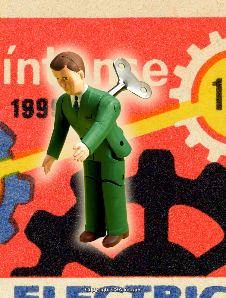 Toy Figurine Depicting Businessman with Wind-Up Mechanism Illustrating Corporate Metaphor