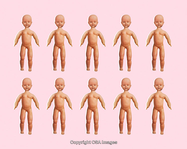 Multiple Vintage Dolls Arranged on Pink Background in Repetitive Pattern Layout
