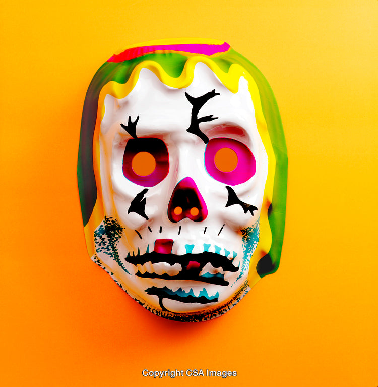 Colorful Skull Mask on Vibrant Yellow Background