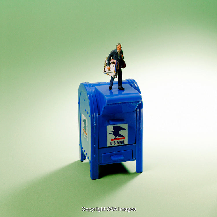 Miniature Mail Carrier Standing on a Blue U.S. Mailbox