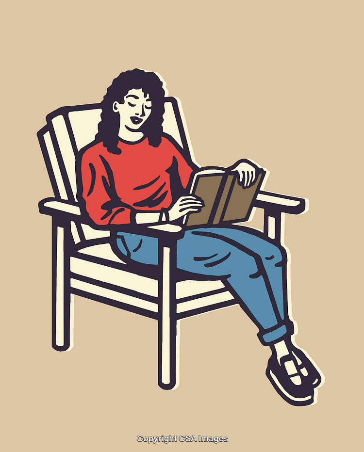 Woman Relaxing in Chair, Reading a Book in a Cozy Setting