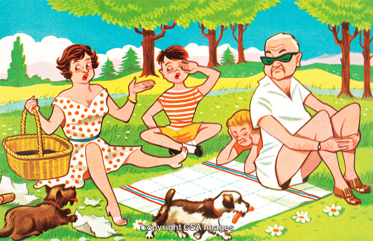 Family Picnic in Nature with Dogs During a Sunny Day