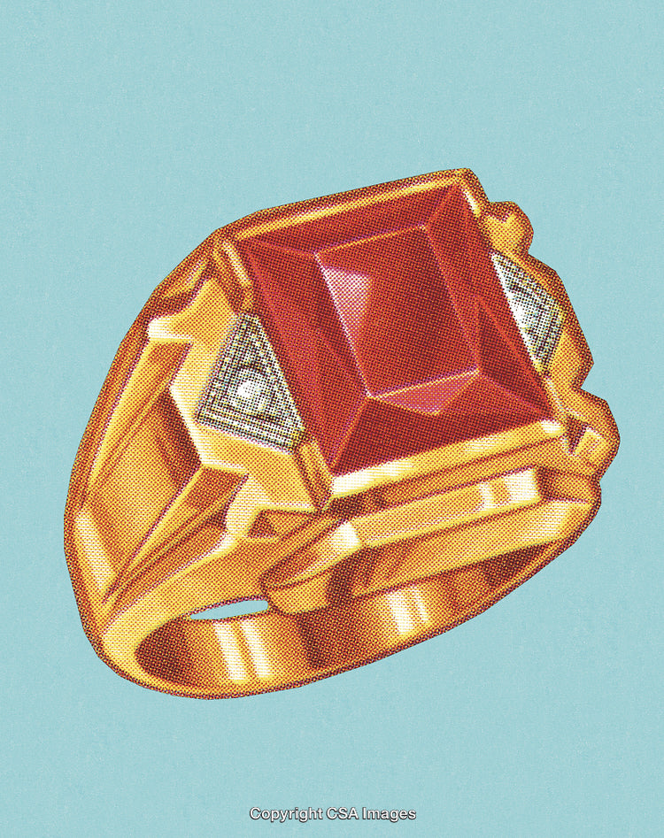 Golden Ring with Red Gemstone on Light Blue Background