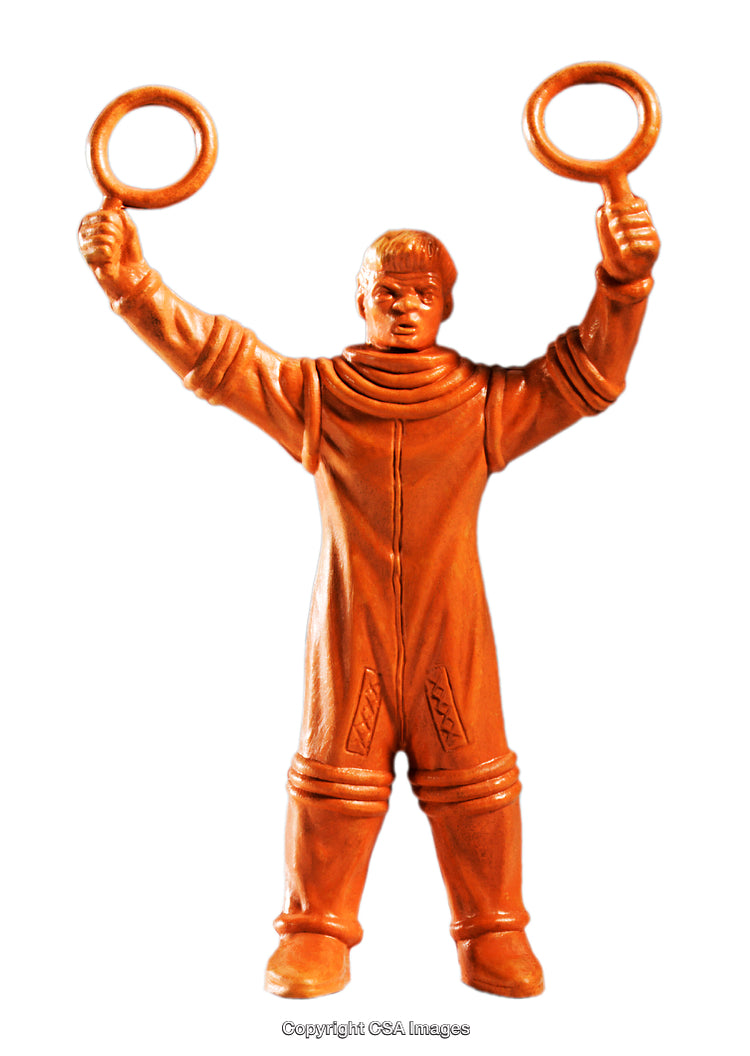 Orange Plastic Toy Figure with Raised Arms and Circular Accessories