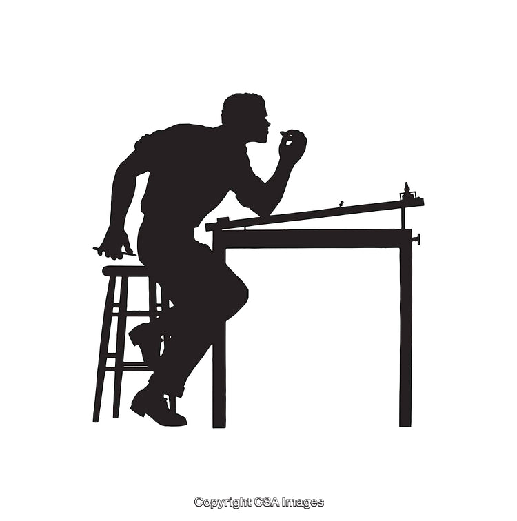 Silhouette of Designer Working at Drafting Table in Black and White