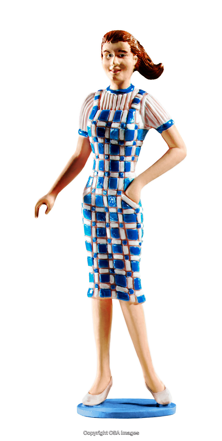 Colorful Figurine of a Woman in a Stylish Checkered Dress