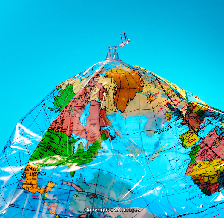 Colorful Inflatable Plastic Globe of the World on Blue Background