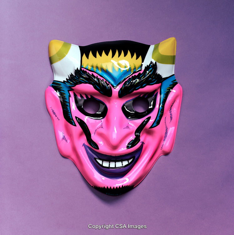 Vivid Decorative Mask in Bright Colors on a Purple Background