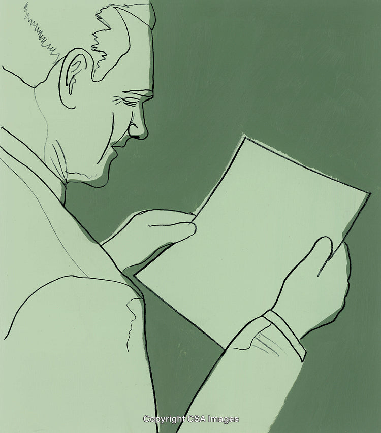 Businessman Looking at a Piece of Paper