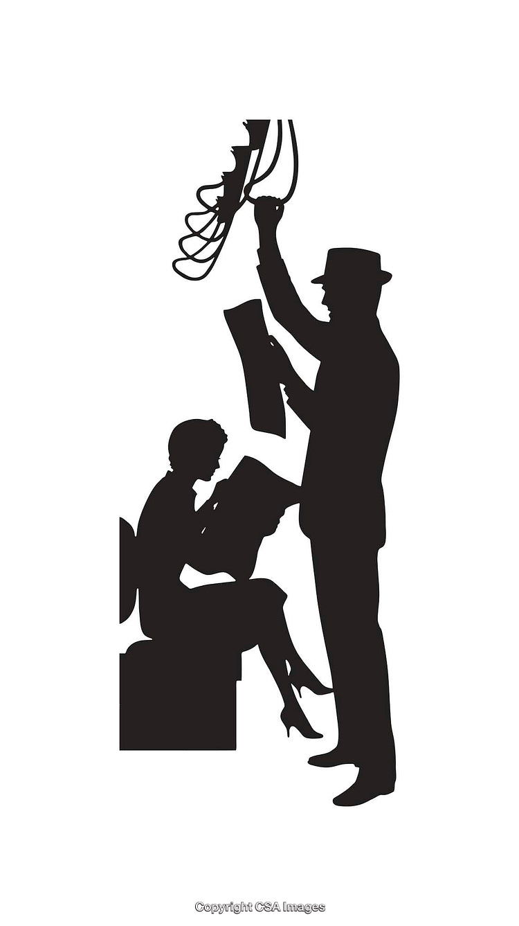 Silhouette of Two Individuals Engaged in Creative Activity