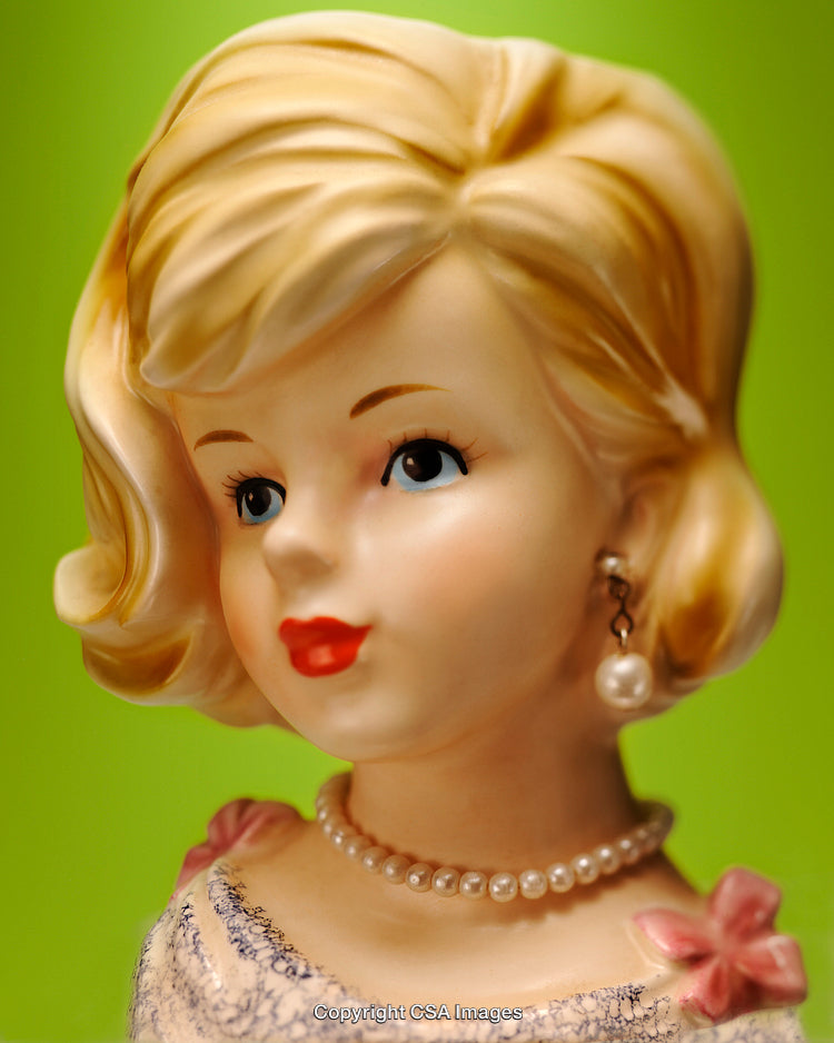 Vintage Ceramic Figurine of a Woman Wearing Jewelry