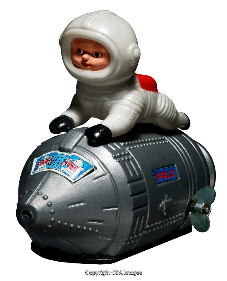Vintage Toy Astronaut Riding a Detailed Rocket Model