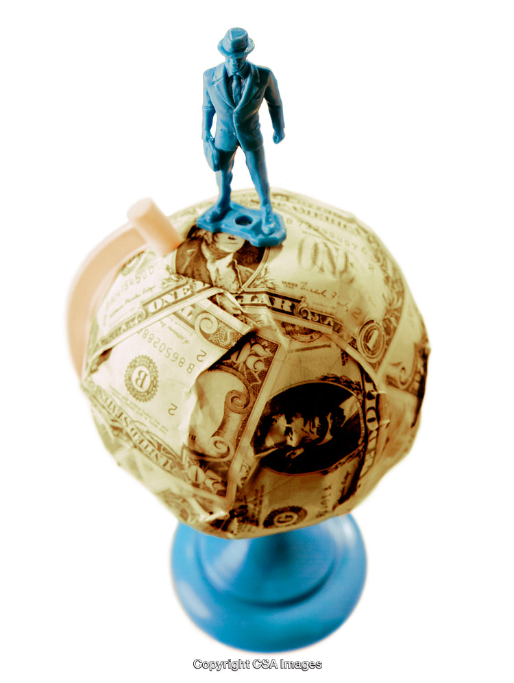 Blue Plastic Toy Figure on Money-Covered Globe with White Background