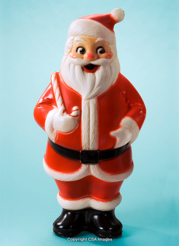 Plastic Santa Figurine Against a Vibrant Background