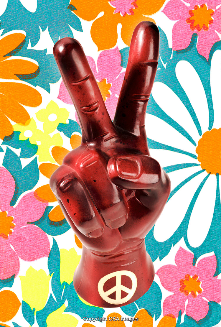 Red Peace Sign Figurine Surrounded by Vibrant Flower Child Inspired Background