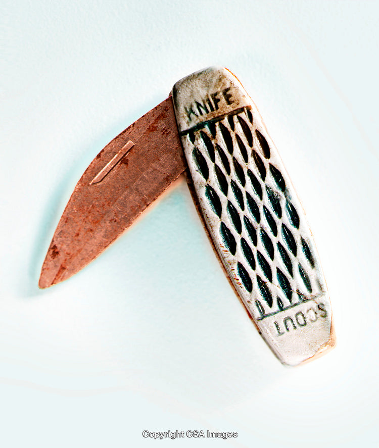 Vintage-Inspired Toy Pocket Knife with Rustic Details and Metal Texture