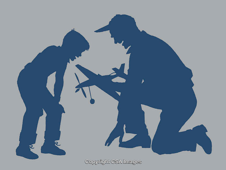 Silhouette of Father and Son Playing with Toy Airplane Together