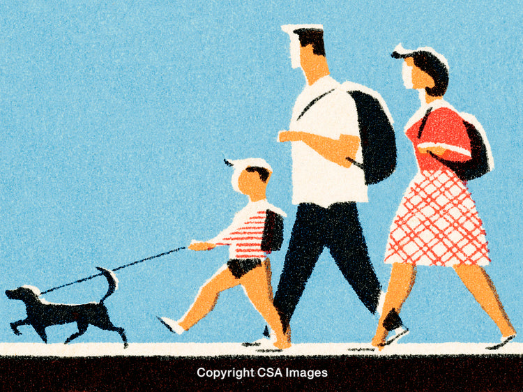 Family Enjoying a Walk Together Under a Clear Blue Sky