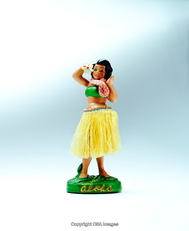 Colorful Hula Doll with Traditional Skirt and Lei on Display