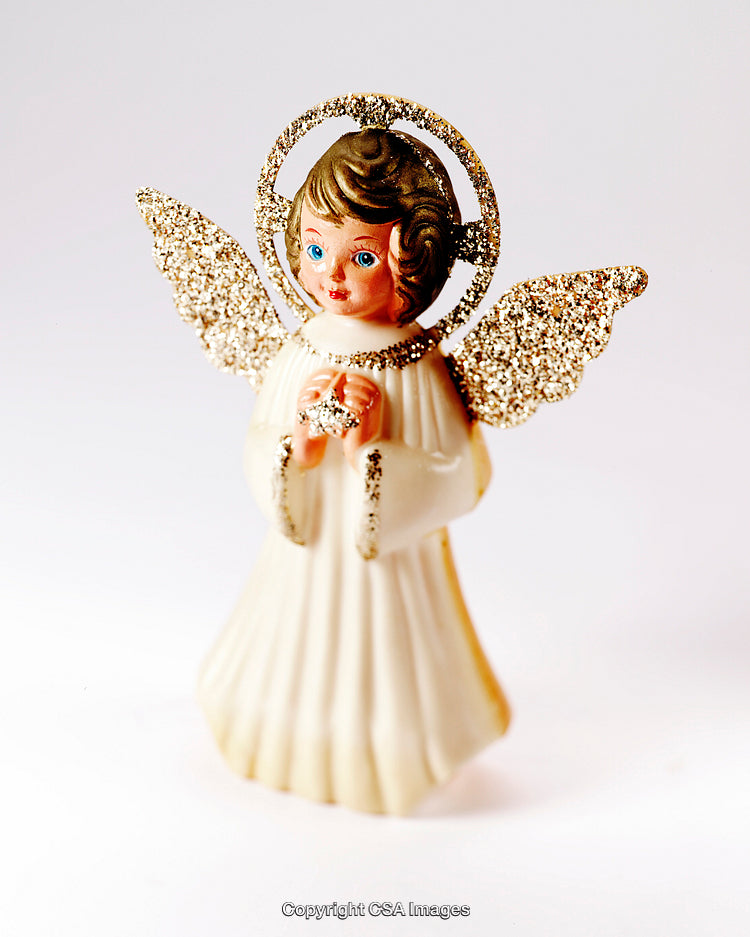 Golden Angel Figurine Ornament With Glittered Wings on White Background