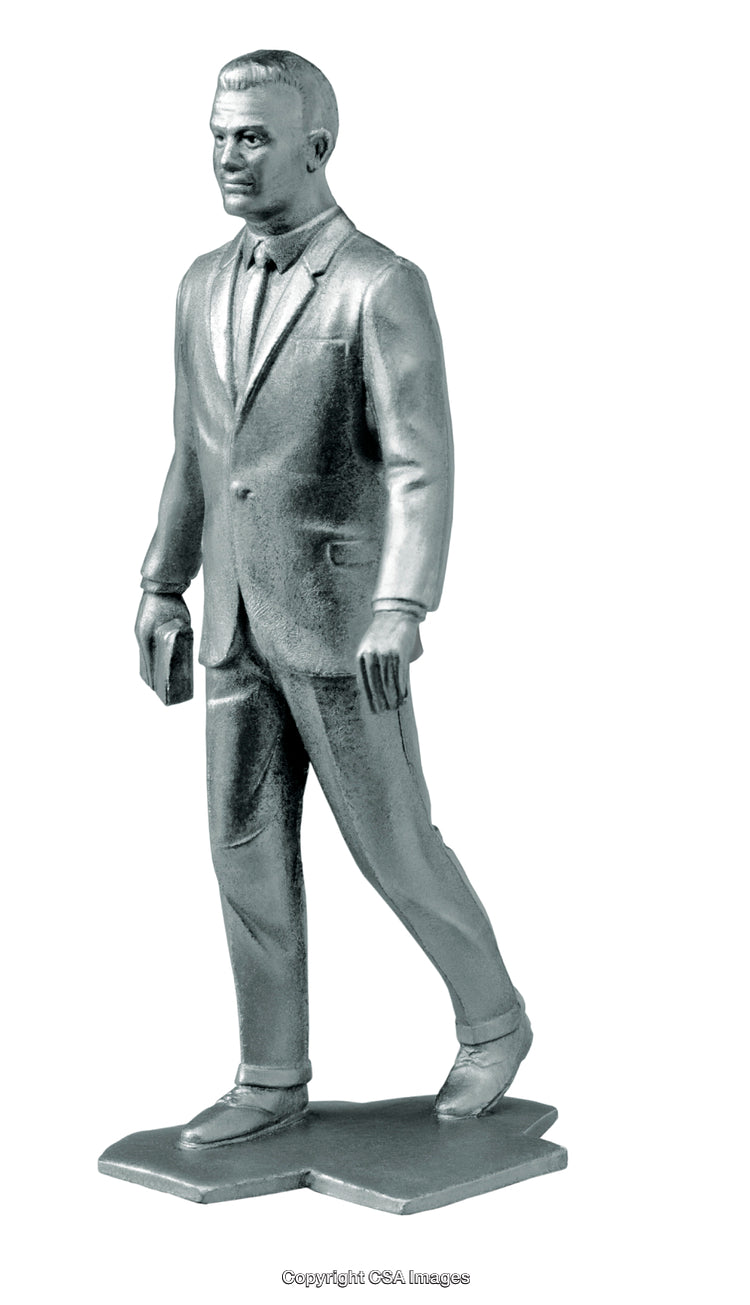 Silver Figurine of Businessman in Suit Standing on Decorative Base